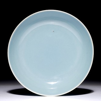 A monochrome Chinese clair-de-lune glazed saucer dish, Qianlong mark, 19/20th C.