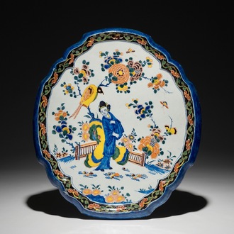 A polychrome Dutch Delft chinoiserie plaque, 18th C.