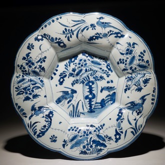 A Dutch Delft blue and white gadrooned chinoiserie dish, 2nd half 17th C.