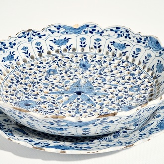 A Dutch Delft blue and white strawberry strainer on stand with pseudo-Chinese mark, 18th C.