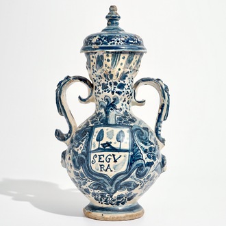 A Spanish pottery blue and white two-handled vase and cover, Triana, Seville, 18th C.