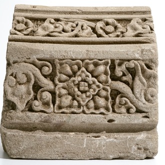 A Romanesque sandstone arch fragment, France, 12/13th C.