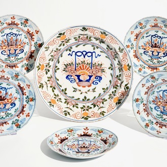 Five polychrome Dutch Delft plates and a dish with flowerbaskets, 18th C.