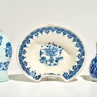 A blue and white French faience shaving bowl, a chinoiserie vase and a jug, Nevers and Moustiers, 17/18th C.