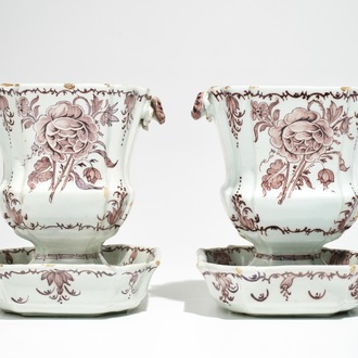 A pair of Dutch Delft manganese jardinieres on stands with floral designs, 18th C.