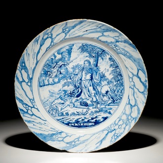 A Dutch Delft style blue and white biblical "Sacrifice of Isaac" dish, Amsterdam, 1st half 18th C.