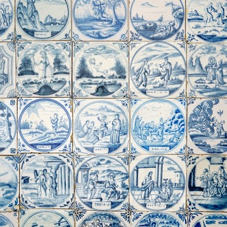 A field of 49 Dutch Delft blue and white tiles with religious scenes, 18/19th C.