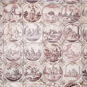 A field of 64 Dutch Delft manganese tiles with religious scenes in central medallions, 18th C.