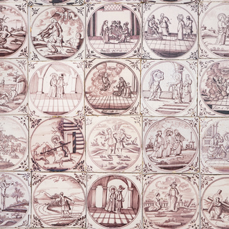 A field of 42 Dutch Delft manganese tiles with religious scenes in central medallions, 18th C.