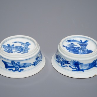 A pair of round Chinese blue and white salts with antiquities design, Kangxi