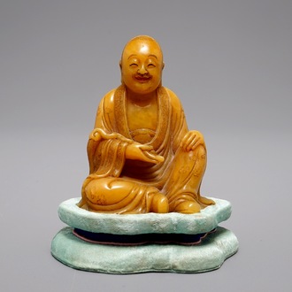 A Chinese Shoushan soapstone carving of a Luohan, 18/19th C.