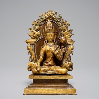 A Sino-Tibetan gilt bronze and copper alloy figure of White Tara, 19/20th C.