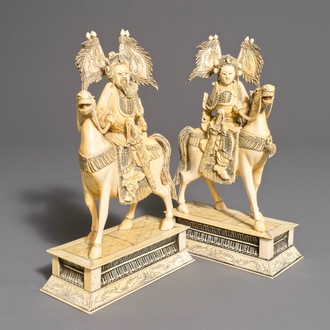 A pair of Chinese carved ivory horseriders, 19th C.