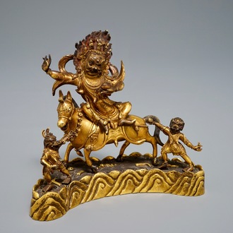 A Sino-Tibetan gilt bronze group of Palden Lhamo, 19/20th C.