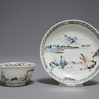 A Chinese cup and saucer with two figures in a landscape, Yongzheng