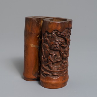 A Chinese carved and inscribed bamboo brushpot, 19th C.