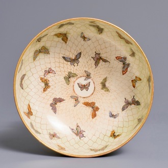 A Japanese Satsuma bowl with netted butterflies, Meiji, 19th C.