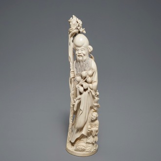A Chinese carved ivory figure of Shou Lao, 1st half 20th C.