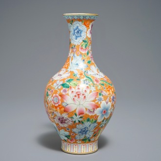 A Chinese famille rose millefleurs vase, Qianlong mark, 20th C.