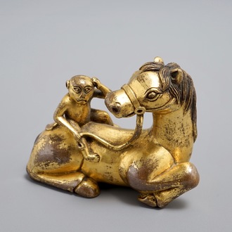 An inscribed Chinese gilt bronze model of a monkey on a horse, 19/20th C.