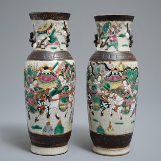 A pair of Chinese Nanking famille rose crackle-glazed vases, 19th C.