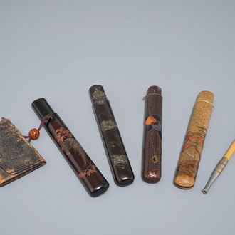 Four Japanese kiseru or tobacco pipe cases, a pipe and a pouch, Meiji, 19th C.