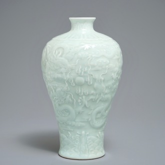 A Chinese celadon meiping vase with underglaze design of dragons, Qianlong mark, 19/20th C.