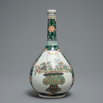 A Chinese famille verte bottle vase with fine flower baskets, 19th C.