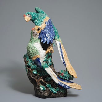 A large Chinese Shiwan pottery group of parrots, impressed mark, 20th C.