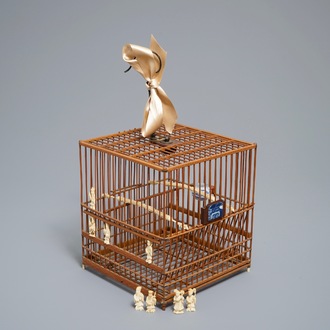 A Chinese wooden bird cage with ivory and porcelain ornaments, 19/20th C.