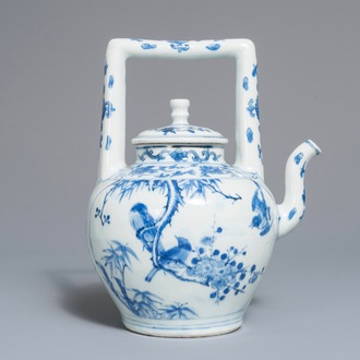 A Chinese blue and white wine jug and cover with fine design of birds and prunus branches, Transitional period