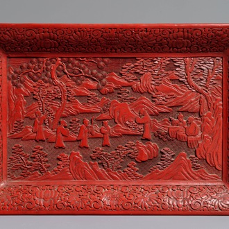 A rectangular Chinese cinnabar lacquer tray with figures in a landscape, 18/19th C.