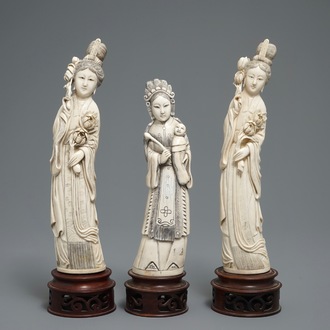 Three Chinese carved ivory figures of ladies on wooden stands, 2nd half 19th C.
