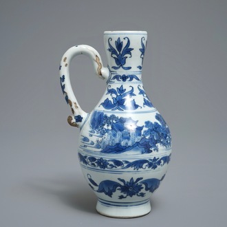Une verseuse en porcelaine de Chine bleu et blanc à décor d'un paysage, époque Transition