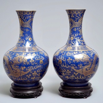 A pair of Chinese monochrome blue vases with gilt dragon design, 19th C.