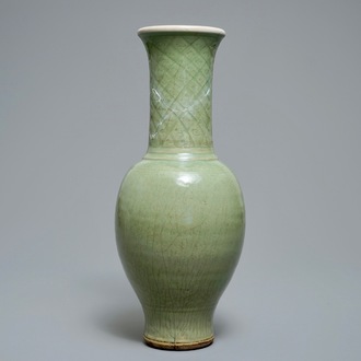 A tall Chinese Longquan celadon vase with underglaze design, Song or Ming