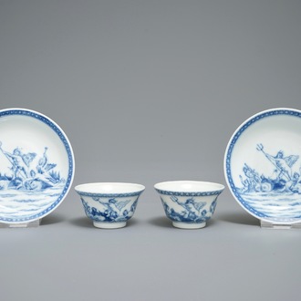 A pair of Chinese blue and white mythological cups and saucers depicting Neptune, Qianlong