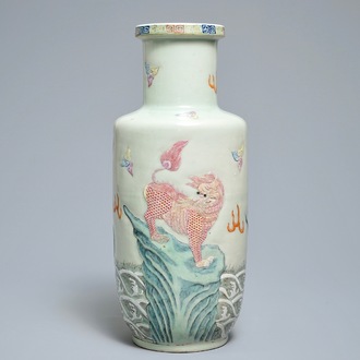 A Chinese famille rose rouleau vase with applied design of mythical beasts, Qianlong mark, 19th C.