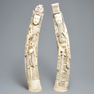 A pair of large Chinese ivory figures of an emperor and his wife, 19th C.