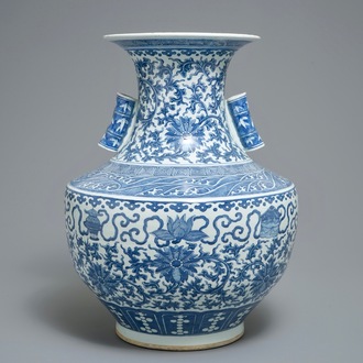 A Chinese blue and white lotus scroll hu vase, 19th C.