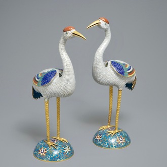 A pair of large Chinese cloisonné and gilt bronze cranes, 18/19th C.