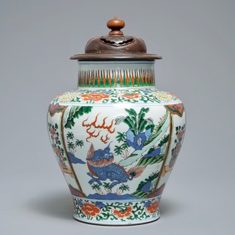 A Chinese wucai vase with mythical beasts, 19th C.