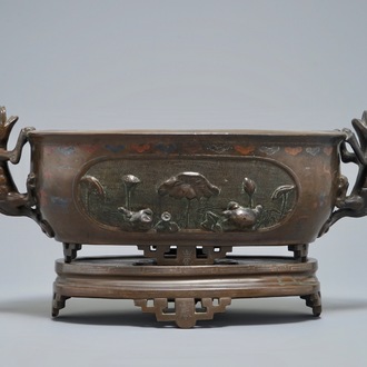 A Chinese silver-inlaid bronze jardinière on stand, 19th C.