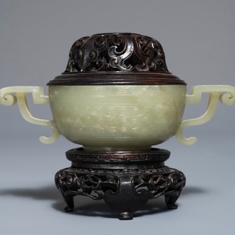 A Chinese celadon jade incense burner with wooden cover and stand, 18/19th C.