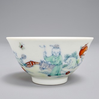 A Chinese doucai tea bowl with playing boys, Yongzheng mark, 19/20th C.