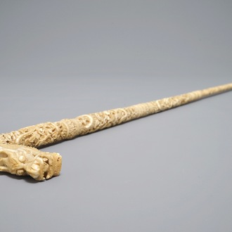 A fine Chinese carved ivory cane with dragon handle, Canton, 19th C.
