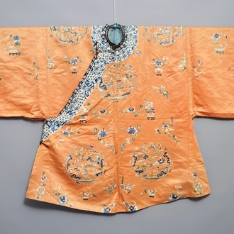 A Chinese orange-ground embroidered silk robe, 19th C.