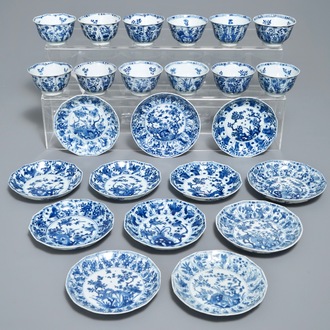 Twelve Chinese blue and white cups and saucers with floral design, Kangxi