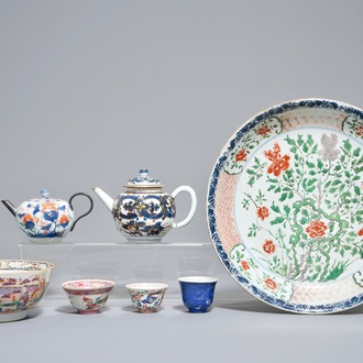 A Chinese famille verte dish, a mandarin bowl, two teapots and three cups, Kangxi and later