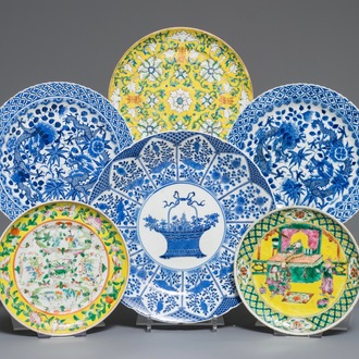 Six Chinese blue and white and famille jaune plates, 19th C.